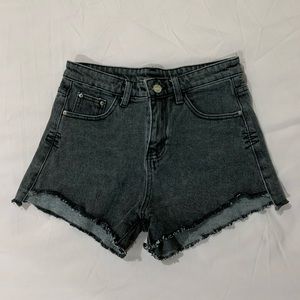 Mid rise gray wash cutoff denim shorts